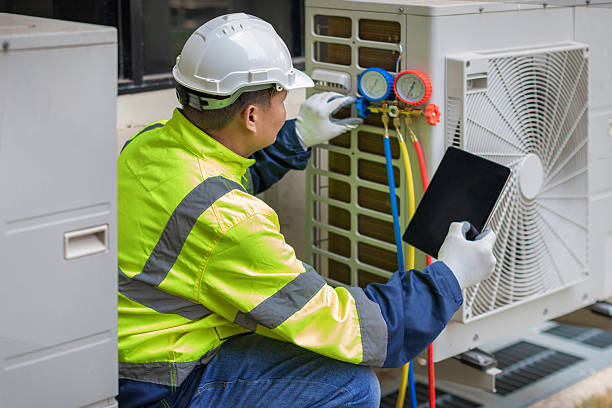 Professional Air Conditioning Repair technician working in Newton, MA